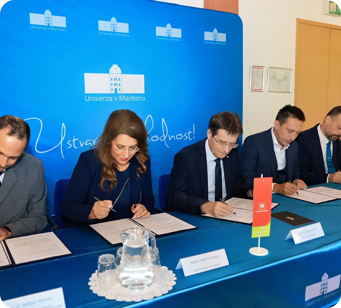 People signing documents