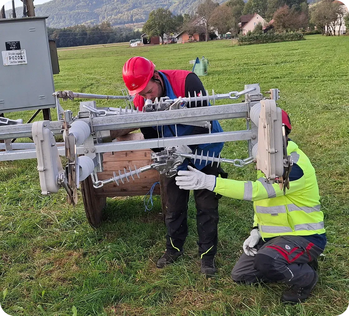 Workers fixing machine