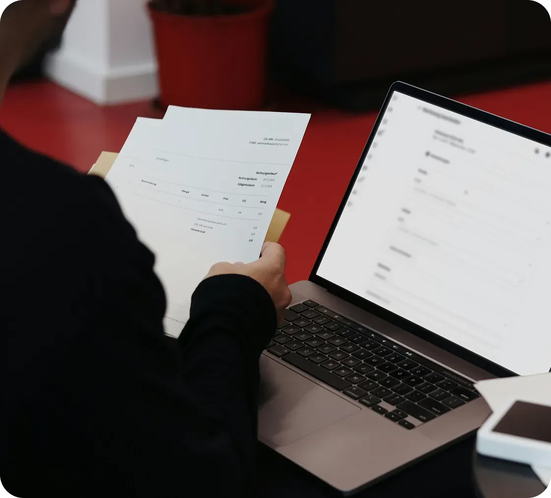 Bills on laptop